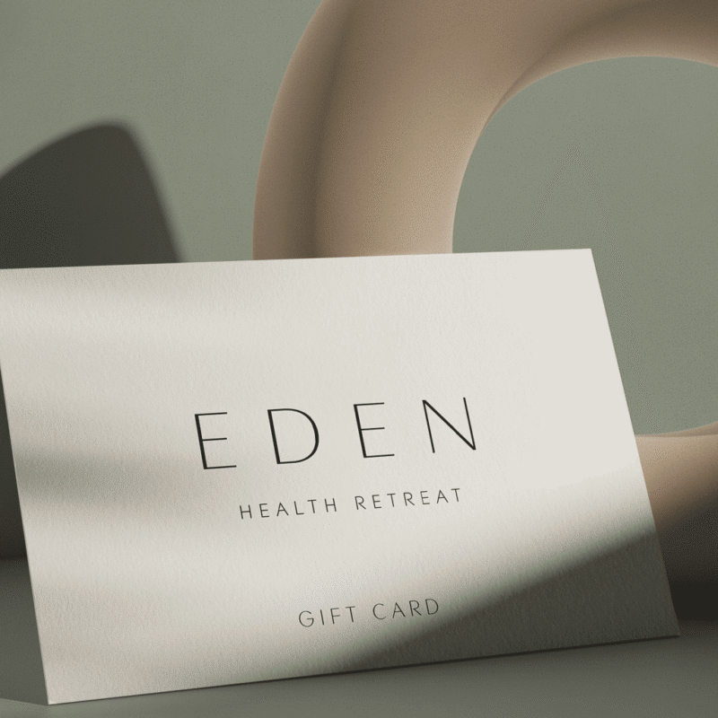 Image of Gift Voucher leaning up against a vase